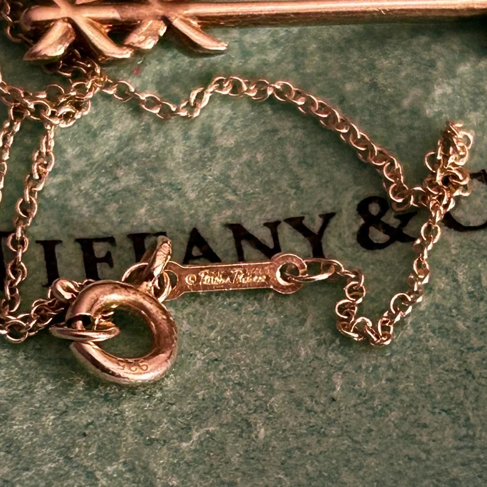 Sold! Tiffany & Co. Silver Arrow Necklace. Hallmarked:
"T & Co. - Picture 7 of 10